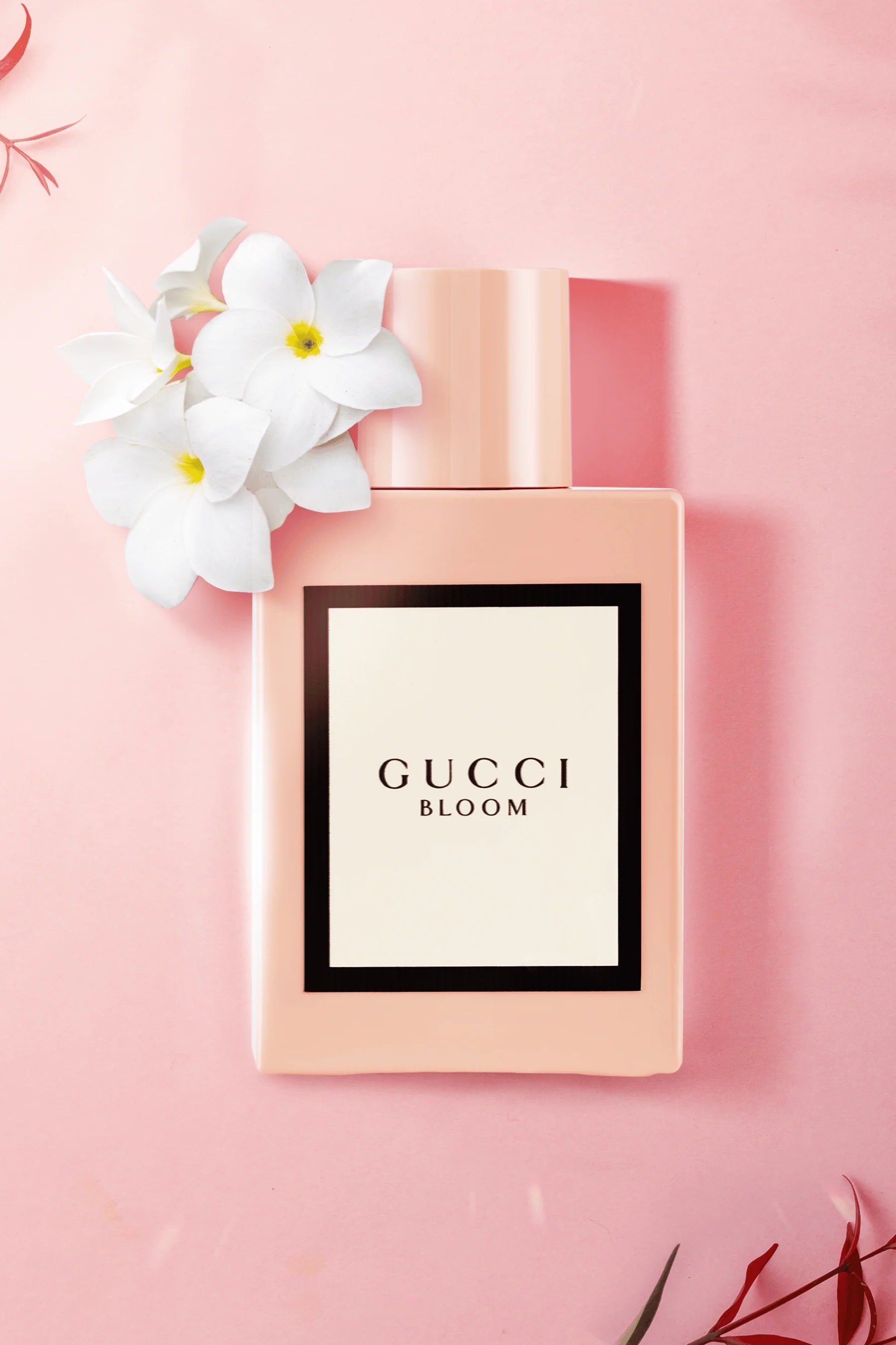 Gucci Bloom perfume bottle with floral scent perfume